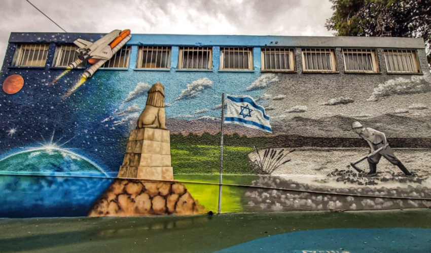 ציור קיר מרהיב של הלל לזרוב בבית הספר תל חי (צילום: ניר בלזיצקי, דוברות עיריית חיפה)