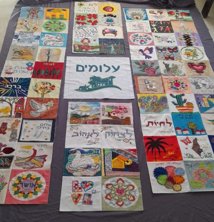 שטיח הקיר שנמסר לקהילת עלומים